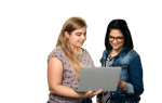 two women looking at laptop